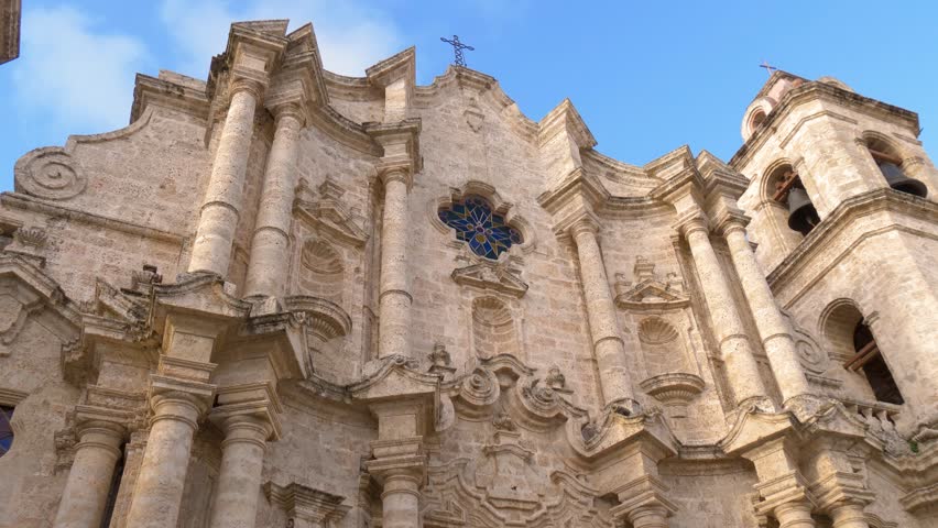 Havana Cathedral. Old Havana, Cuba: The Cathedral of the Virgin Mary of the Immaculate Conception facade. Tilt down shot of the front exterior of the cathedral of San Cristobal in old Havana