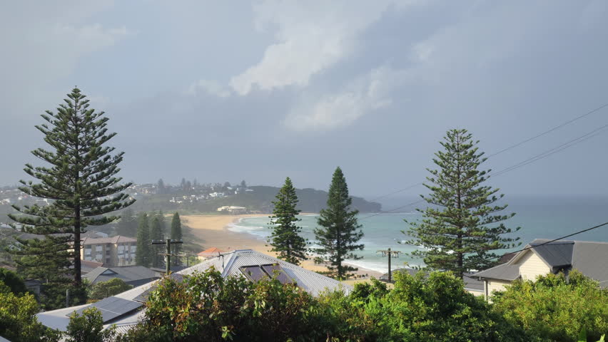 Panoramic view of Curl Curl beach in Sydney, Australia, on a cloudy morning