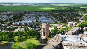 Aerial video (flying in a circle) of residential area of Amersfoort Nieuwland, The Netherlands.