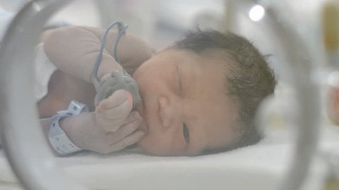 Newborn 20 minutes old in child hood,labour room in hospital