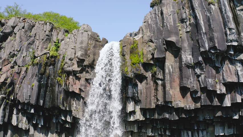 Aerial view of the spectacular Svartifoss waterfall, into the Skaftafell area of Vatnajokull National Park provides visitors with a breathtaking view of Svartifoss (Black Falls).