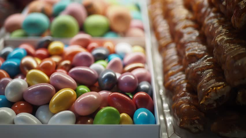 colorful candy sweet jelly in a glass jar displaying at candy shop 