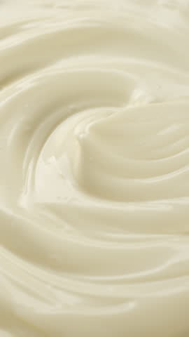 Mayonnaise cream sauce close up, rotation