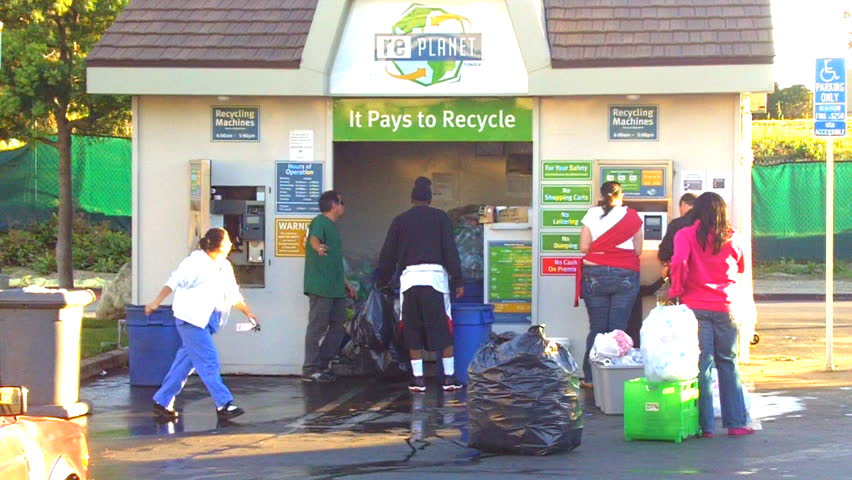 LONG BEACH, CA - February 23, 2013: People line up at a self-service recycling