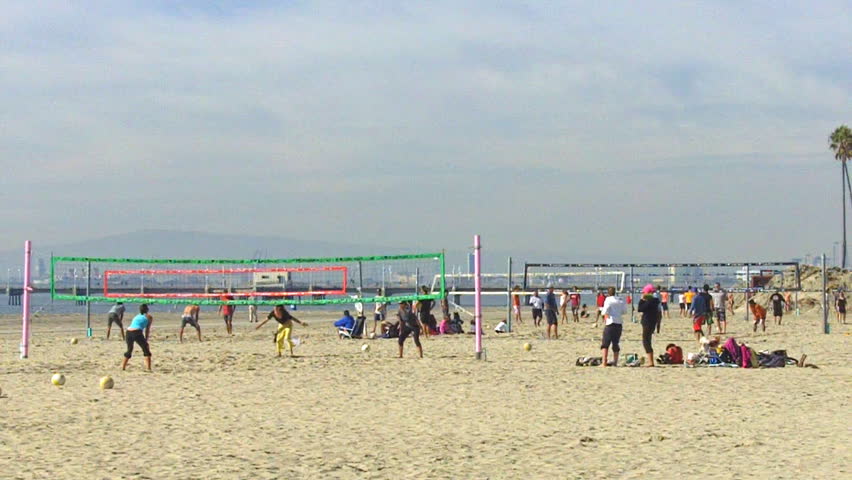 LONG BEACH, CA - February 23, 2013: A wide shot of young people playing