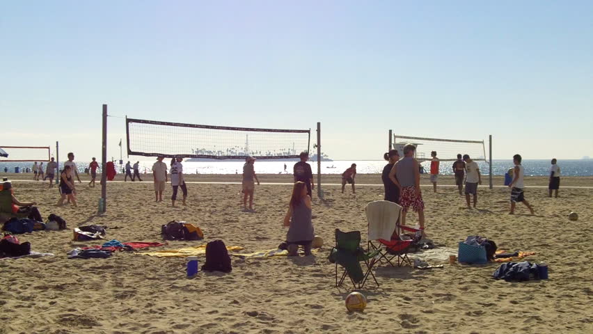 LONG BEACH, CA - February 23, 2013: A medium shot of two volleyball games being