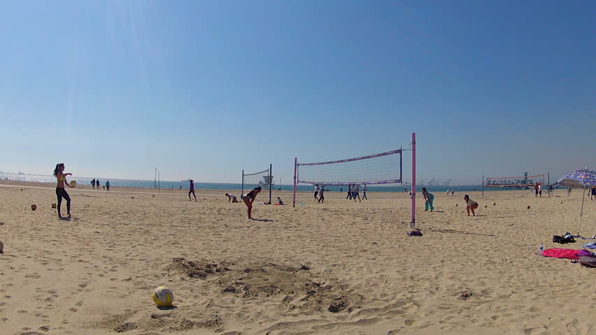 LONG BEACH, CA - February 23, 2013: A wide shot of young women playing