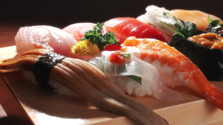Assorted Fresh Sushi on Traditional Wooden Platter