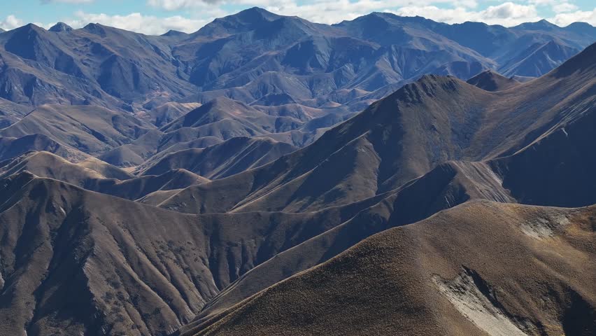 Majestic mountain range, Southern Alps, Lindis Pass, New Zealand. Beautiful birds eye landscape.