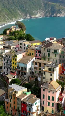 Colorful houses of Corniglia, Cinque Terre on vertical video.
