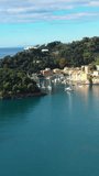 Ligurian Sea and stunning nature of Portofino on vertical video.