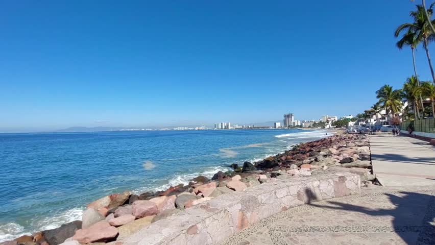General view of the famous Malecon of Puerto Vallarta, Jalisco, Mexico. Tourist walkway in the center of the tropical city of Puerto Vallarta, Jalisco, Mexico.