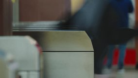 Time-lapse blurred motion passengers going through tourniquet to subway platform. Entrance to railway or bus station, automatic ticket scanner turnstile. People swipe cards to pay public transport - Powered by Shutterstock - Get 15% off with code: PIKWIZARD15