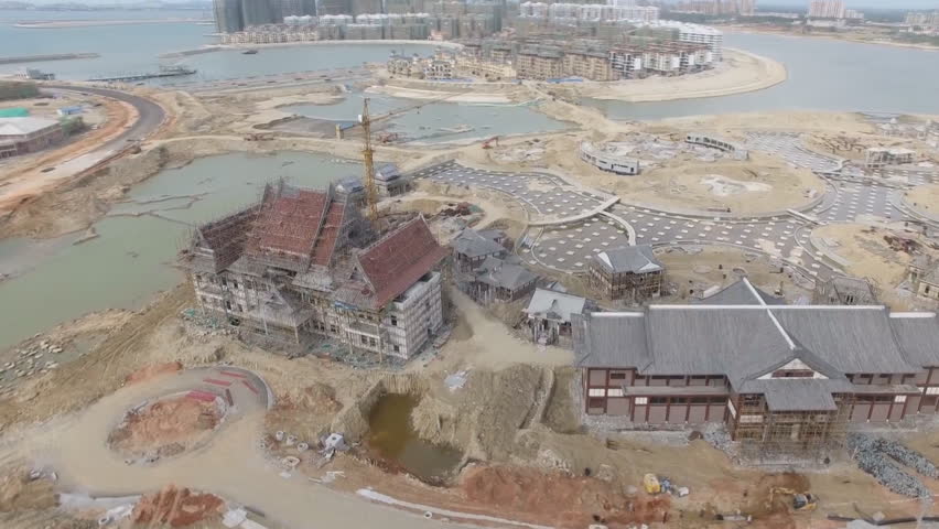 China (Hainan) Free Trade Zone Free Trade Port Haikou City Scenery. Haihua Island construction change of hydrodynamic situation near an artificial island project on Haihua Island (aerial photography)