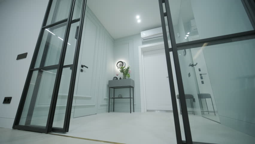 Modern Entryway with Glass Doors and Console Table