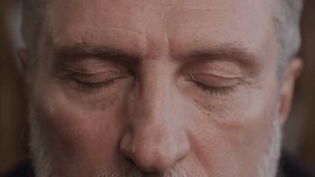 Intense Close-Up Portrait of Senior Man - Powered by Shutterstock - Get 15% off with code: PIKWIZARD15