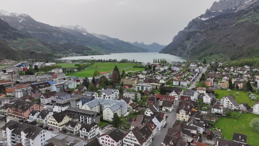Walenstadt is a village on the shore of Lake Walensee in Switzerland. Aerial view over the landscape in the valley