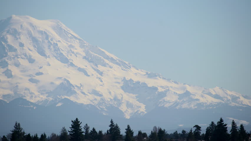 Mount Rainier Volcanic Peak Covered with Snow in Washington State