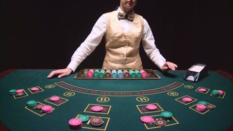 Casino Female Croupier Takes The Stock Footage Video 100 Royalty Free 35020234 Shutterstock