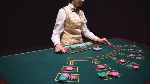 Casino Female Croupier Takes The Stock Footage Video 100 Royalty Free 35020234 Shutterstock