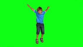 Boy jumping on green screen in slow motion - Powered by Shutterstock - Get 15% off with code: PIKWIZARD15