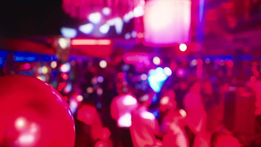 Blurred Beatscape: Dive into the Euphoric Blur of Nightlife, Where Neon Lights and Dynamic Movement Create a Symphony