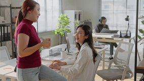 Asian Friendly happy diverse team workers talking laughing drinking coffee together in office,cheerful workers staff group chatting sharing story enjoying having fun at work,good relations at break - Powered by Shutterstock - Get 15% off with code: PIKWIZARD15