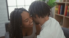 African american couple sharing a tender moment together in a cozy living room, evoking love and intimacy. - Powered by Shutterstock - Get 15% off with code: PIKWIZARD15