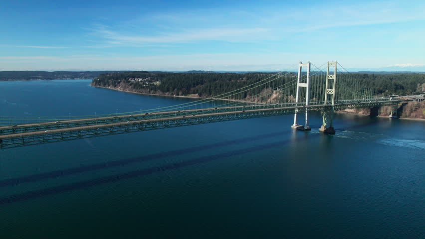Washington Aerial View Panning Tacoma Narrows Bridge Over Blue Ocean Water