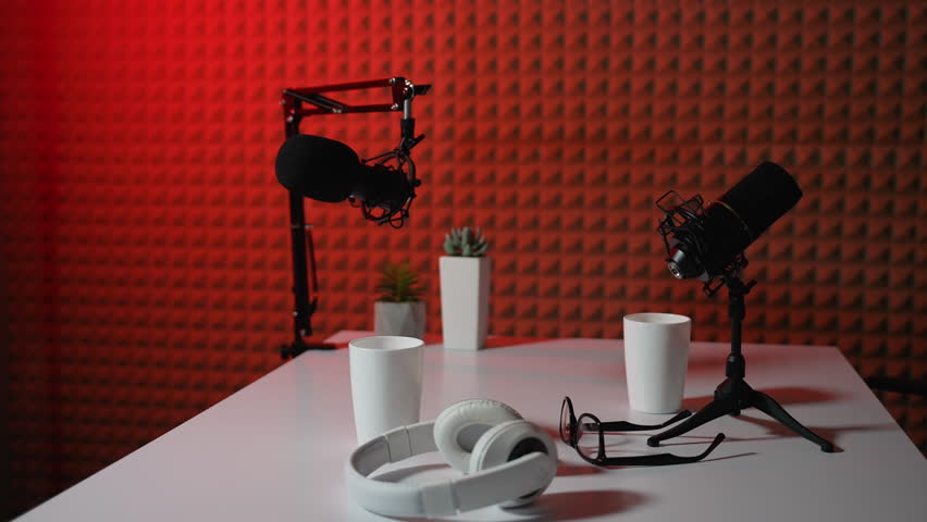 Equipment for recording radio podcast, two microphones and headphones. Live streaming studio