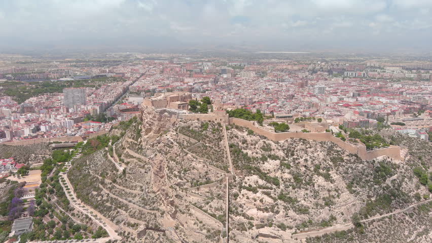 Alicante, Spain: Aerial view of Santa Barbara Castle (Castillo de Santa Bárbara) in famous Spanish summer tourist resort by Mediterranean Sea on Costa Blanca - landscape panorama of Europe from above