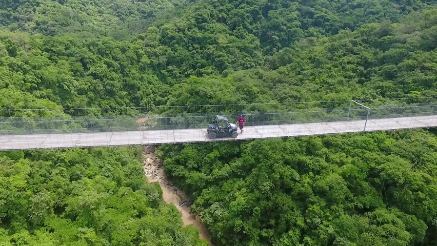 Person in the Middle of the Suspension Bridge, Puerto Vallarta, Mexico