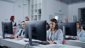 In Contact Center Of Bank Or Insurance Company, Women Workers With Headset Consulting Clients - Powered by Shutterstock - Get 15% off with code: PIKWIZARD15
