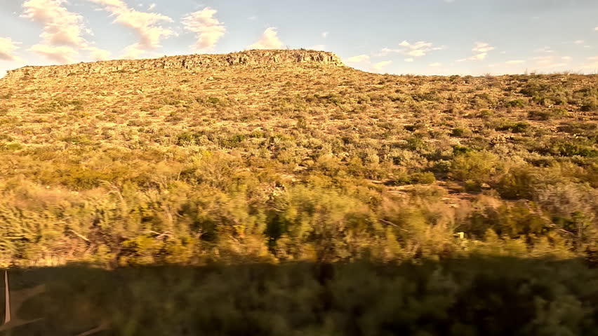 Prairie Country.  The view from a train as it crosses prairie land on the approach to Sanderson, Texas in the United States of America.