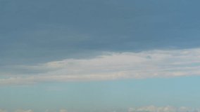 Time-lapse of clouds and a double rainbow after the rain on a blue sky. - Powered by Shutterstock - Get 15% off with code: PIKWIZARD15