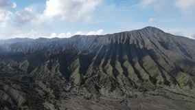 Beautiful aerial view of Mount Bromo, the best sunrise location in Indonesia, the most beautiful volcano in Java, Indonesia | videography 4k drone aerial footage