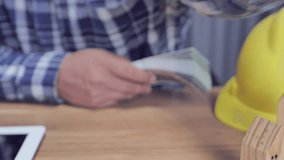 Engineer counting dollars concept of income from work - Powered by Shutterstock - Get 15% off with code: PIKWIZARD15