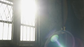 Shade and shadow on old window. Morning sunlight shining through the window. A ray of morning sun in an old window. - Powered by Shutterstock - Get 15% off with code: PIKWIZARD15