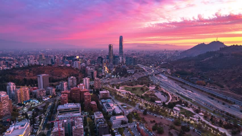 Hyperlapse drone shot of the Providencia Skyline, sunset in Santiago de Chile