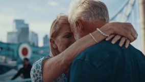 Happy senior couple spending time together in London city. Beautiful woman and man hugging on the tower bridge. Concepts about seniority, lifestyle and travel
 - Powered by Shutterstock - Get 15% off with code: PIKWIZARD15