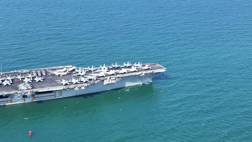Nuclear Navy ship, Military navy ship carrier full loading fighter jet aircraft for prepare troops. nuclear carrier running in the ocean