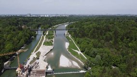 Aerial drone footage of railway bridge over the Isar river in Munich