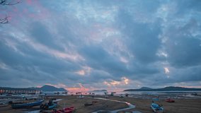 time lapse clouds moving in colorful sky at twilight above fishing port in Rawai beach Phuket. 
Nature video High quality footage.
Scene of Colorful sky sunset with cloud background.
