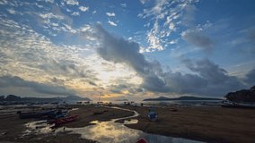 time lapse clouds moving in colorful sky at sunrise above fishing port in Rawai beach Phuket. 
Nature video High quality footage.
Scene of Colorful sky sunset with cloud background.