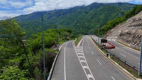 Aerial video near the Quebrada Sinifaná in which you observe a section of the new road known as 