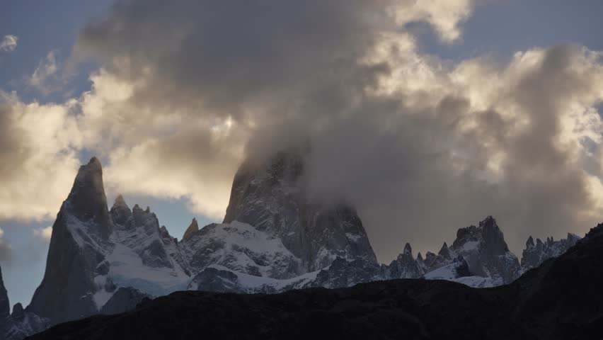 Dramatic timelapse of clouds swirling around the peaks of Fitz Roy at sunset