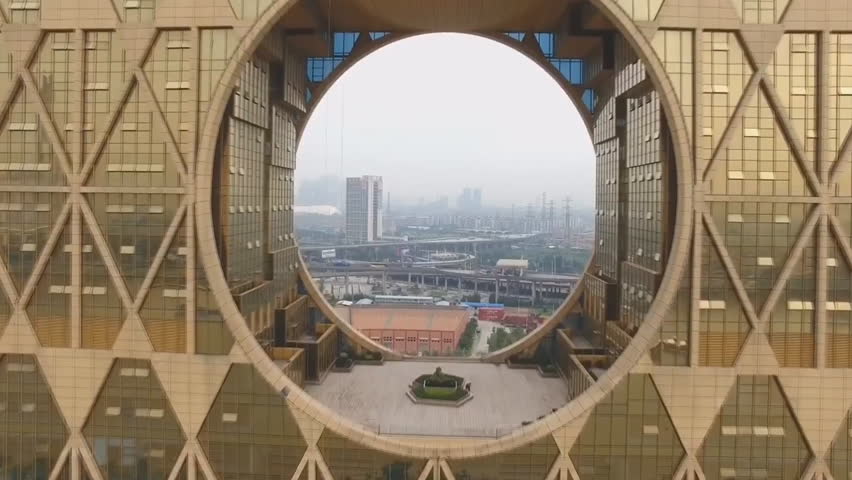 Guangzhou Circle in Guangzhou, China. Guangzhou-Yuan - a high-rise building in the Chinese city of Guangzhou, Guangdong Province, built in 2013. (aerial photography)