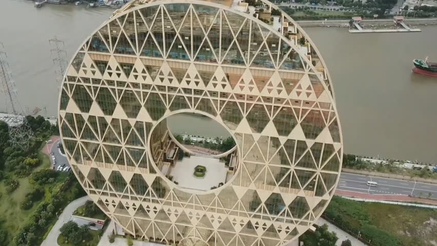 Guangzhou Circle in Guangzhou, China. Guangzhou-Yuan - a high-rise building in the Chinese city of Guangzhou, Guangdong Province, built in 2013. (aerial photography)