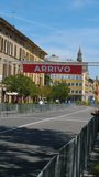 Finish line of a bike race event in Italy. Slow motion.