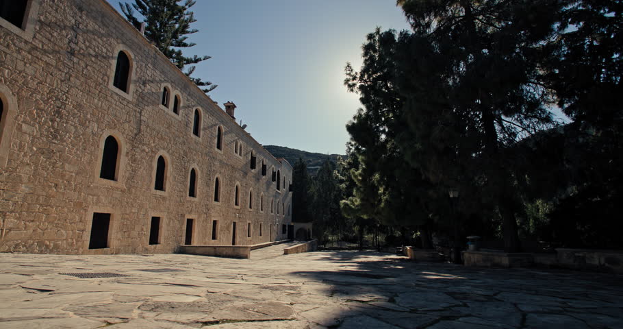 The beautiful sarovine building of the Monastery of Agios Neophytos. Arched windows in the mountain church on the island of Cyprus. High quality 4k footage
